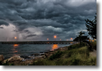 Storm clouds and lightning over Wantagh from Jones Beach fishing pier - Photo by Fred Greco